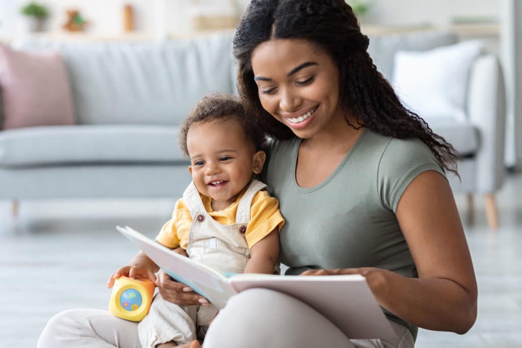 baby-development-young-black-mommy-reading-book-w-2021-12-09-19-23-26-utc-1